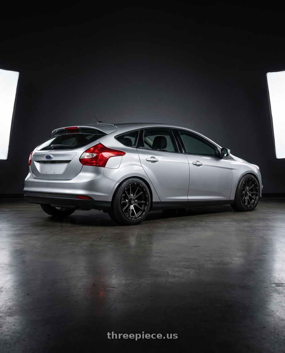 2014 ford focus mk3 1.6 silver  with KMC KM100 SYNC 5X127/5X139.7 17X9 +0 SATIN BLACK WITH GRAY TINT wheels rear three quarter view slight stretch tires