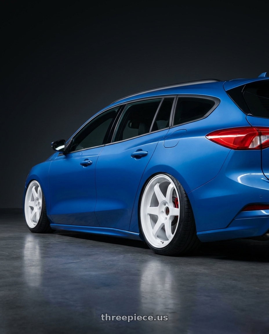 2026 ford focus wagon with Volk Racing TE37SL 5x120 19x10.5 +22 WHITE wheels rear three quarter view extreme stretch tires
