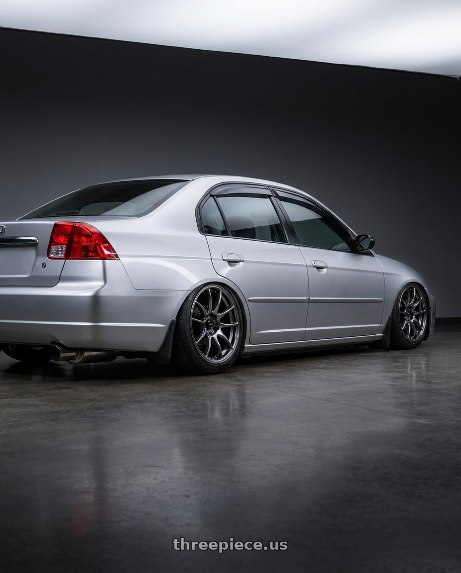 2002 Honda civic with Vors TR4 5x100 17x8  +35 Hyper Black wheels rear three quarter view slight stretch tires