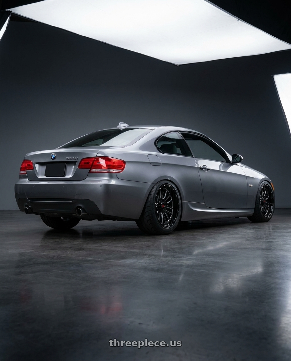 2009 e92 335i m sport highline coupe, space grey with Worx 818BM 8x165.1 20x12 -44 Gloss Black w/ Milled Accents wheels rear three quarter view meaty tires