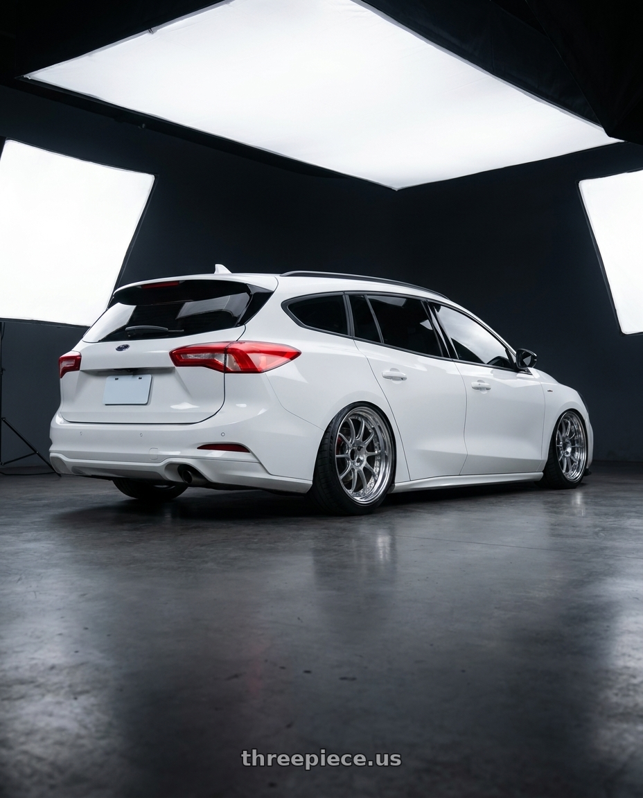 2023 ford focus wagon with SSR Professor SP5 5X100 18X9+31 HP Disk High Bright Silver wheels rear three quarter view meaty tires