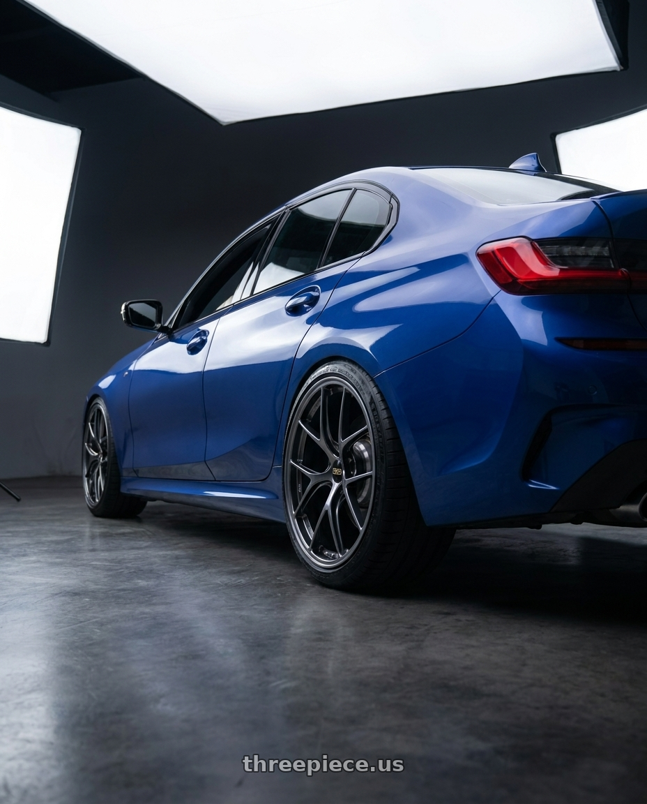 2019 BMW 330i with BBS RI-D 5x114.3 20x11 +50 Diamond Black wheels rear three quarter view extreme stretch tires