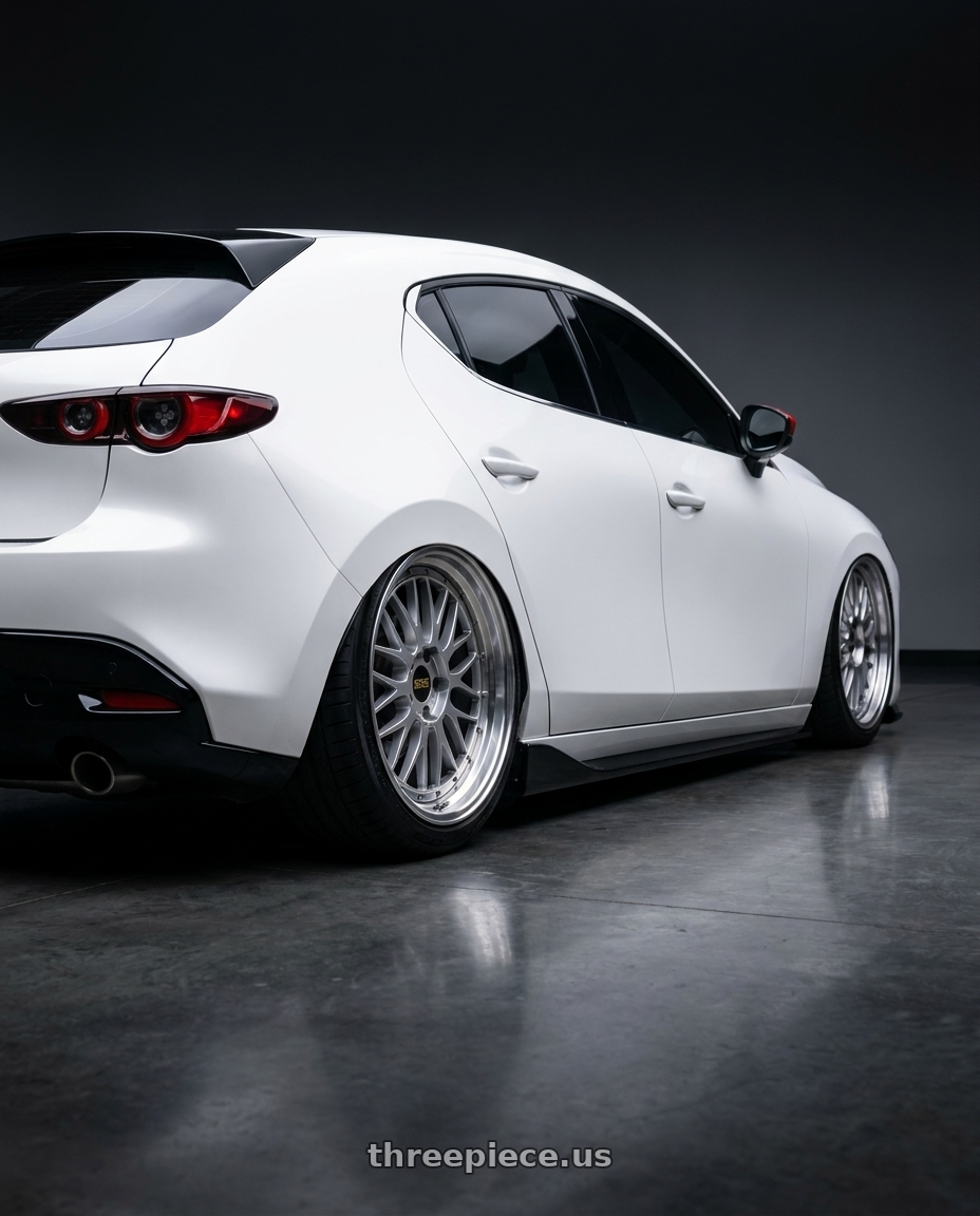2024 Mazda Mazda3 Fastback  with BBS LM 5x114.3 18x8.0+40 Diamond Silver wheels rear three quarter view slight stretch tires