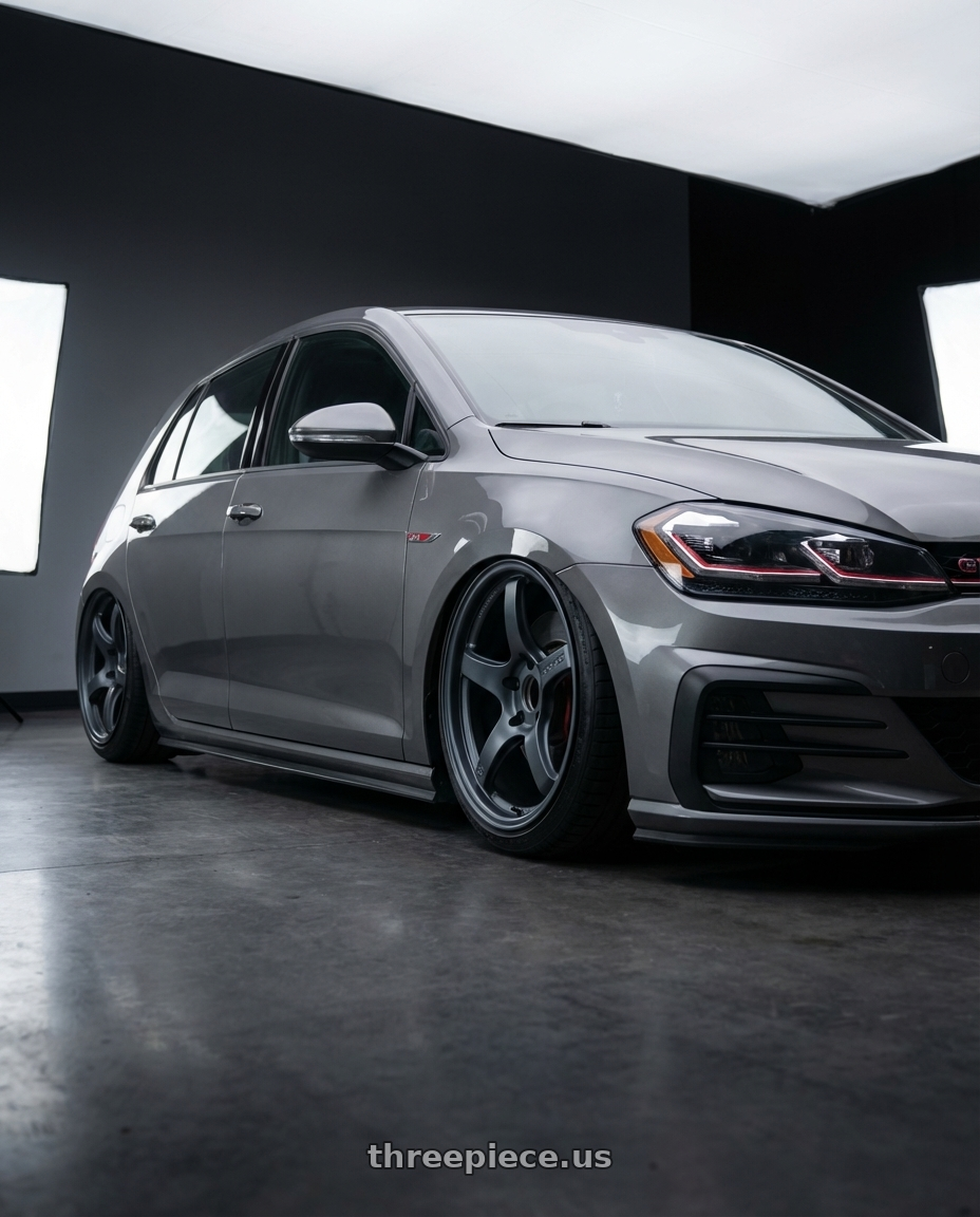 2019 Volkswagen GTI MK7 with Gram Lights 57CR 5x112 19x9.5+45 Gunblue II wheels front three quarter view stanced stance
