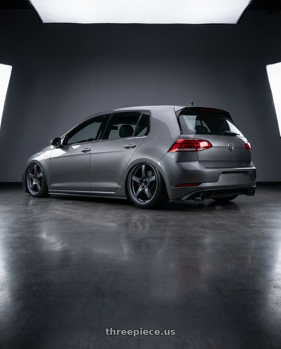 2019 Volkswagen GTI MK7 with Gram Lights 57CR 5x112 19x9.5+45 Gunblue II wheels rear three quarter view slight stretch tires