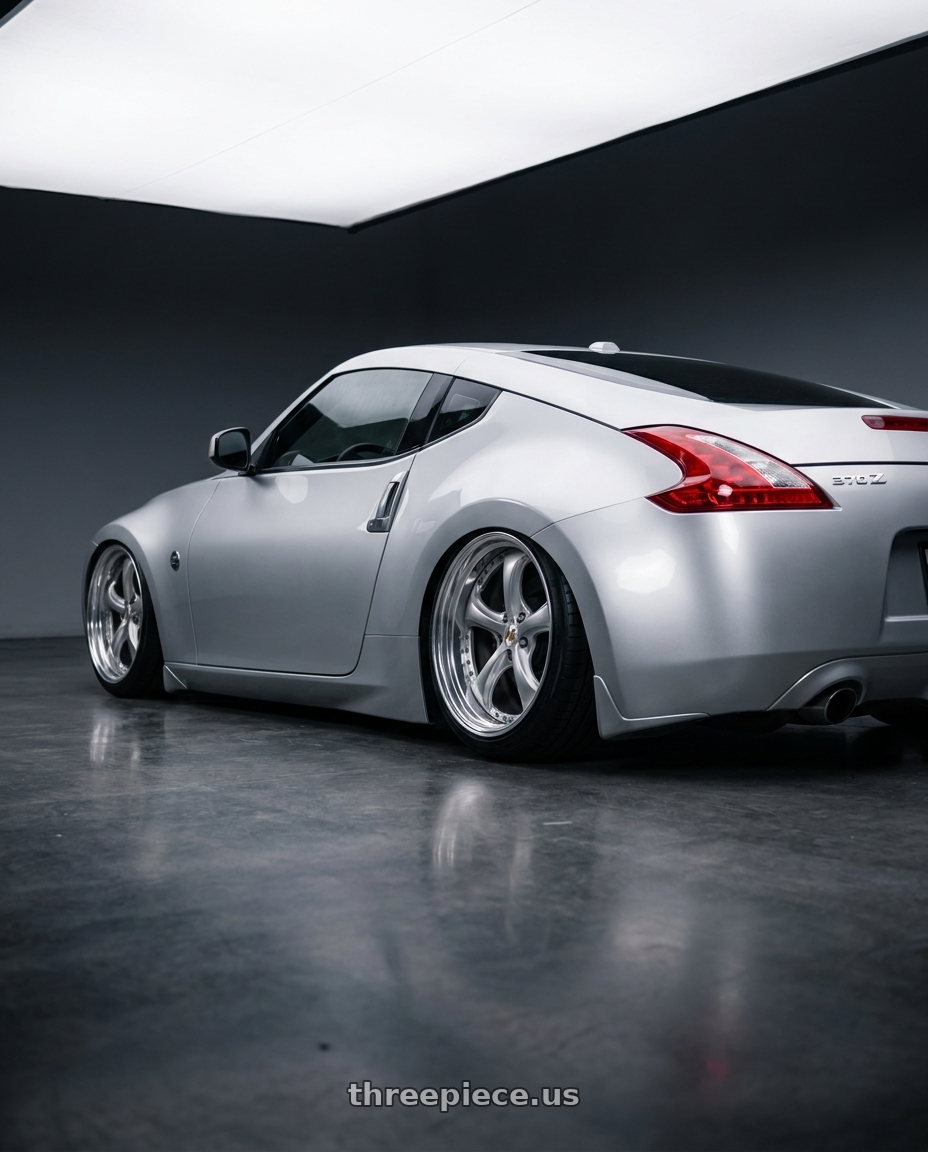 2009 Nissan 370z with Work Wheels VS-KF 5x114.3 19x9+28 Light Grey Silver L Disk STEP RIM wheels rear three quarter view extreme stretch tires