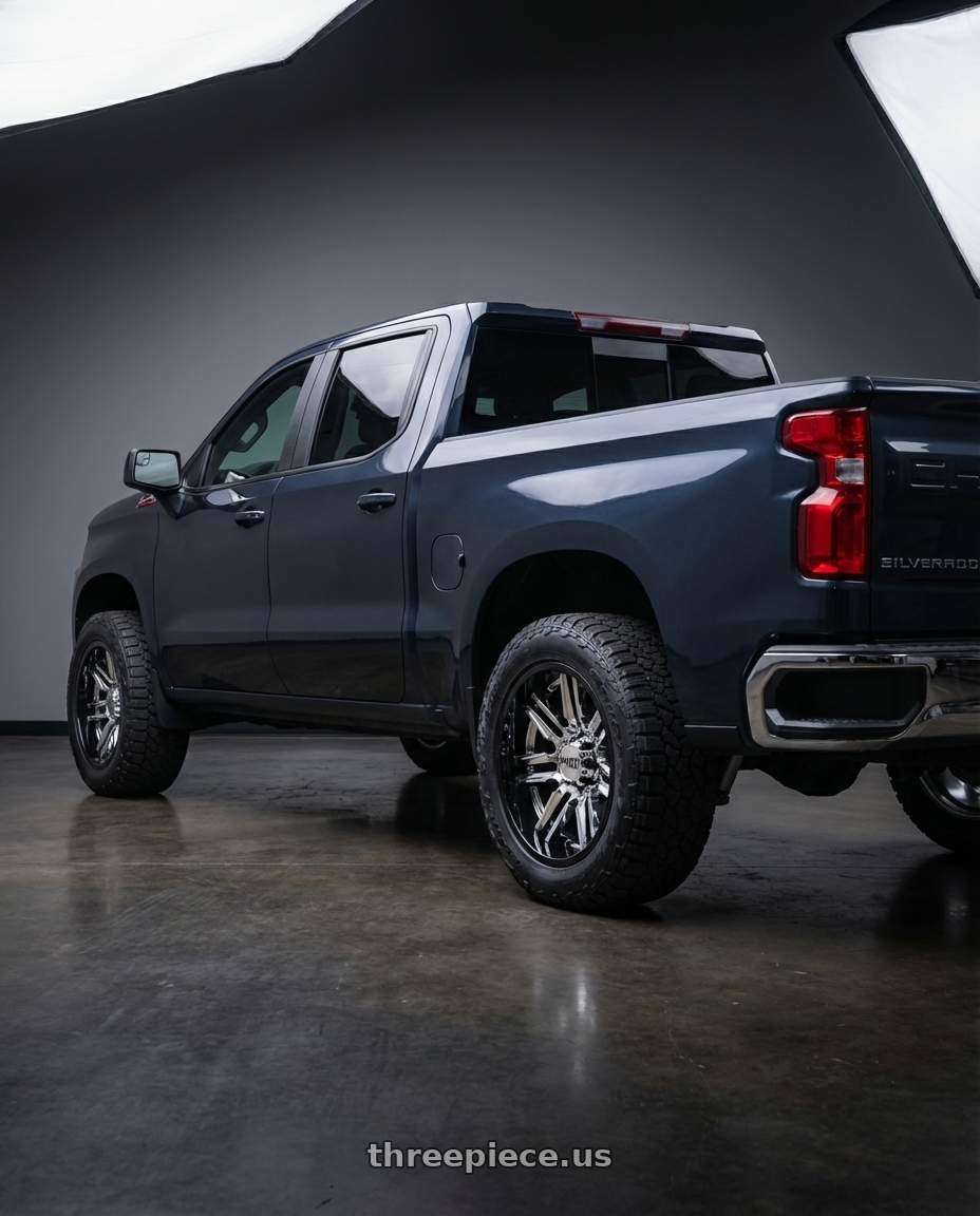 2023 Chevrolet Silverado 1500 with Moto Metal MO202 6X139.7 20X10 -18 CHROME CENTER GLOSS BLACK MILLED LIP wheels rear three quarter view meaty tires