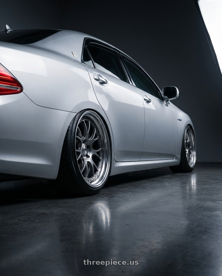 2010 Toyota Crown with SSR Professor MS3 5x114.3 19x9.5+35 MD Disk Titan Silver wheels rear three quarter view extreme stretch tires