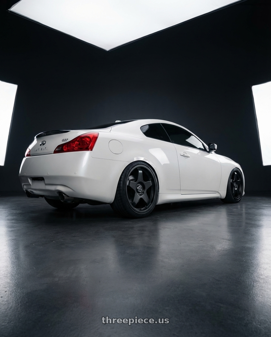 2014 Infiniti G37 Coupe with fifteen52 CHICANE 5x114.3 / 5x120 19x8.5 +35 ASPHALT BLACK (SATIN BLACK) wheels rear three quarter view slight stretch tires