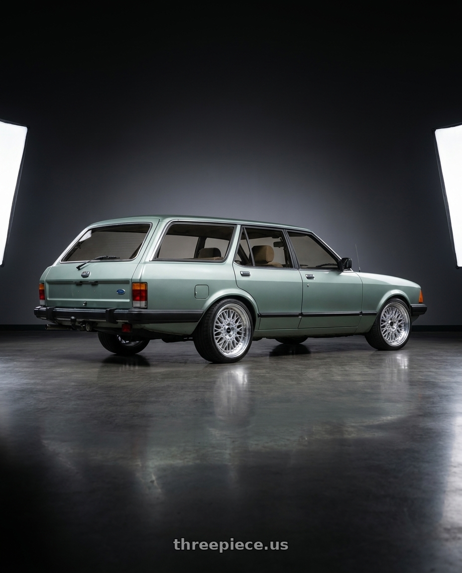 1985 Ford granada with ARC AR1 5x108 17x9.5  +35 Silver Machine Face Lip Chrome Rivet wheels rear three quarter view square tires