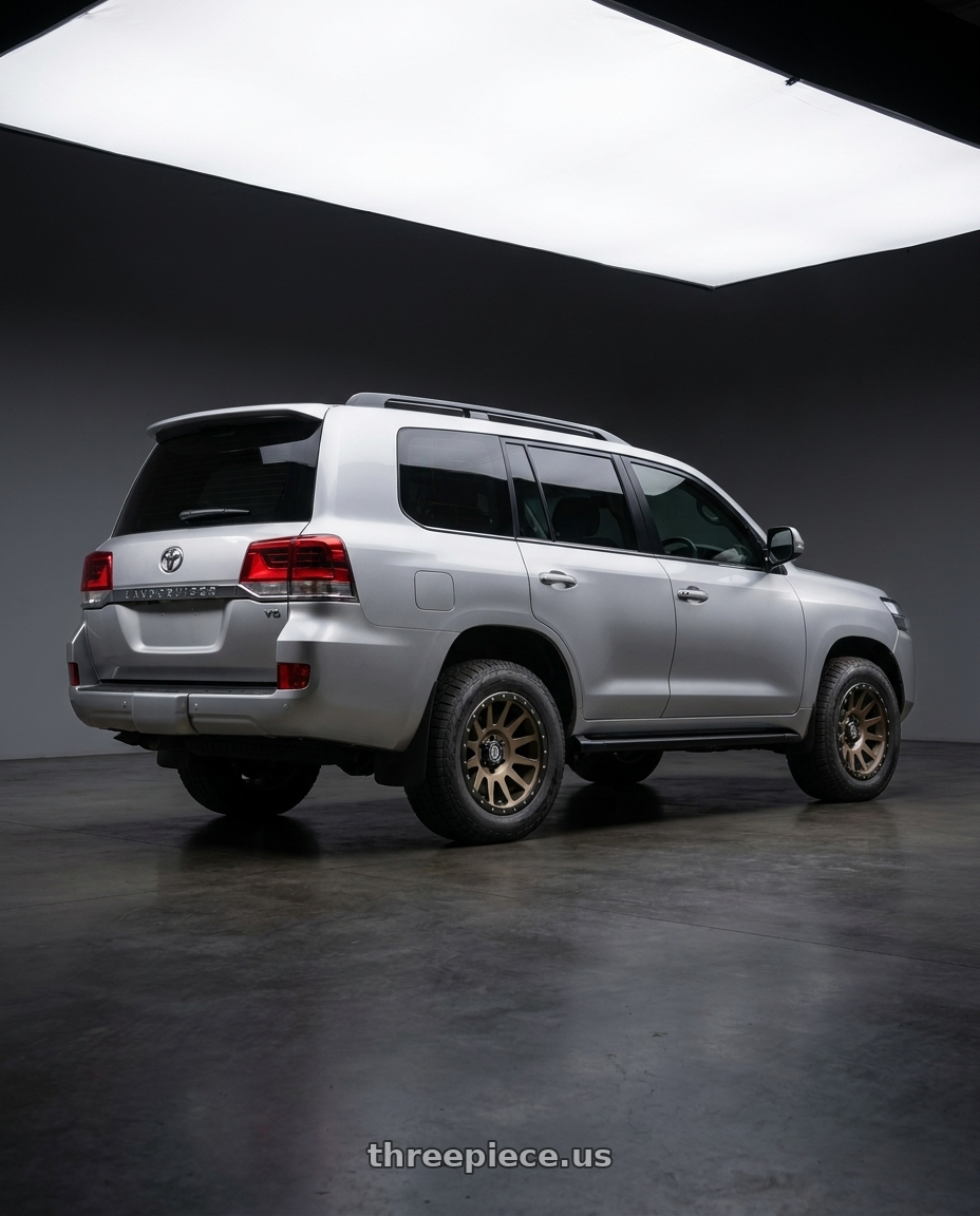 2017 Toyota Landcruiser 200 with Icon Alloys COMPRESSION 5x150 18x9+25 BRONZE wheels rear three quarter view square tires