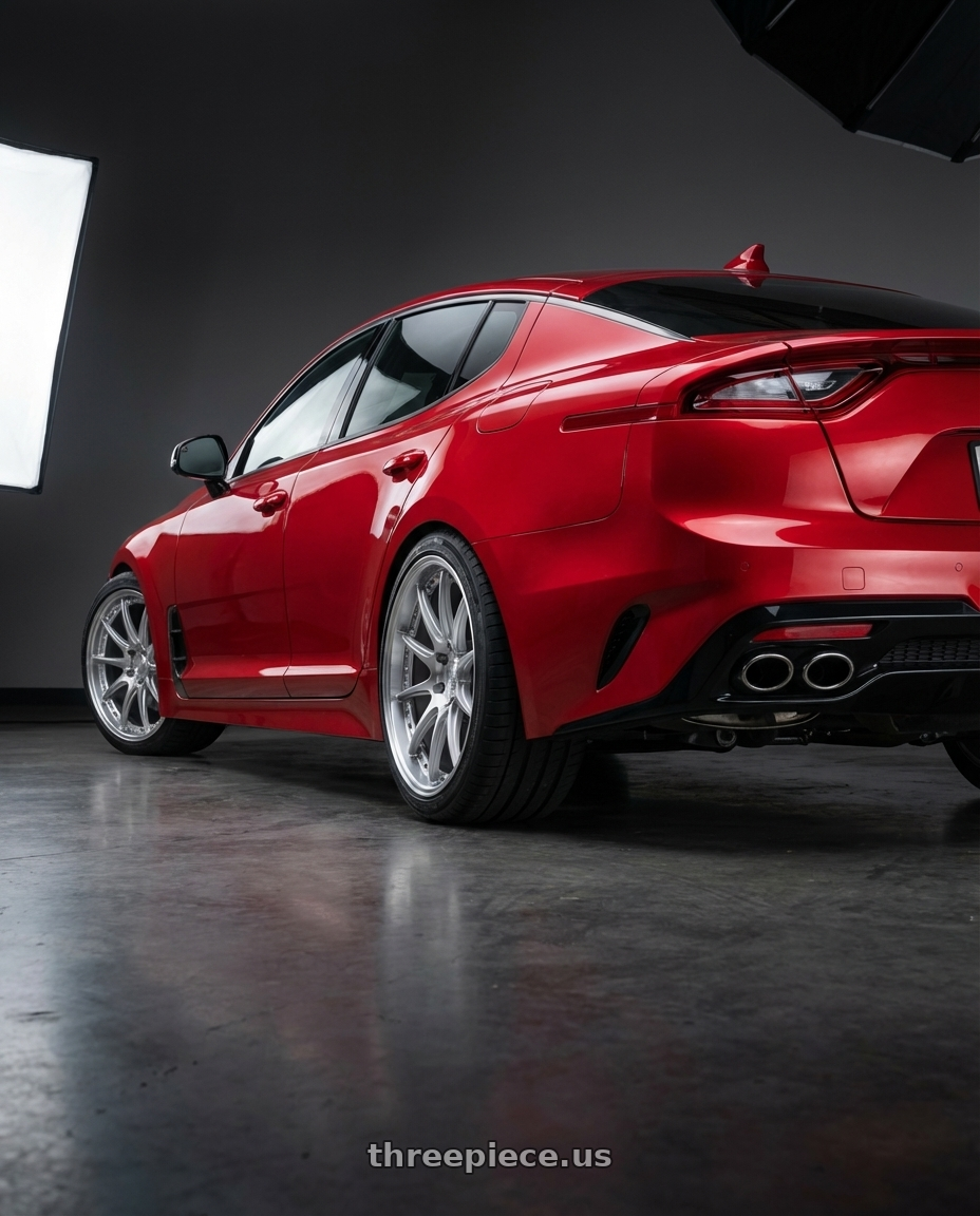 2022 Kia Stinger GT with Aodhan DS07 5x114.3 19x9.5+22 Silver w/Machined Face wheels rear three quarter view square tires