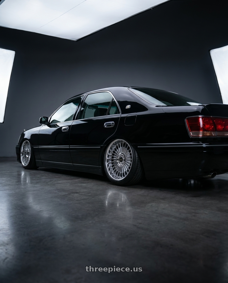 2000 Toyota Crown athlete V with Work Emitz Chrome 5x114.3 19x10.0 +12 wheels rear three quarter view slight stretch tires