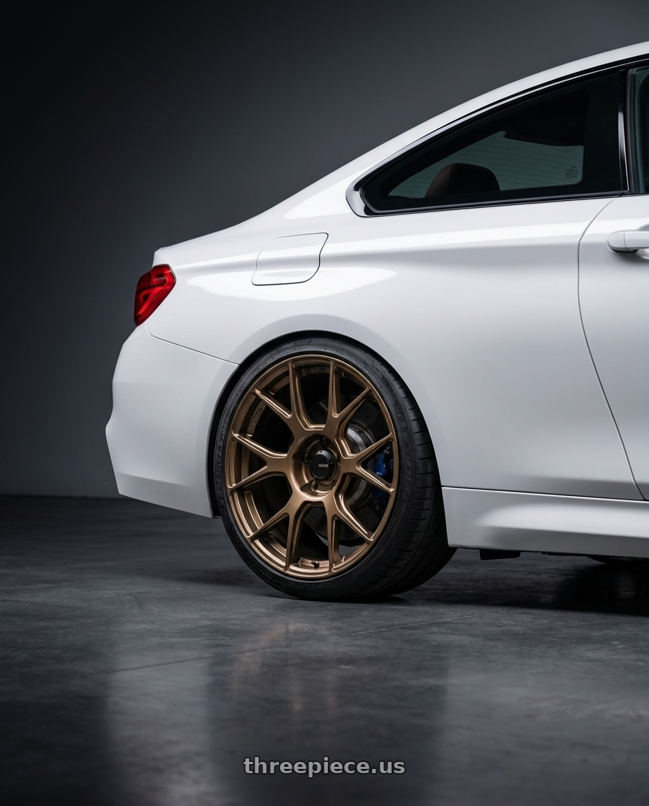 2018 BMW M4 F82 with Konig Ampliform 5x120 19x10+28 Gloss Bronze wheels rear three quarter view square tires