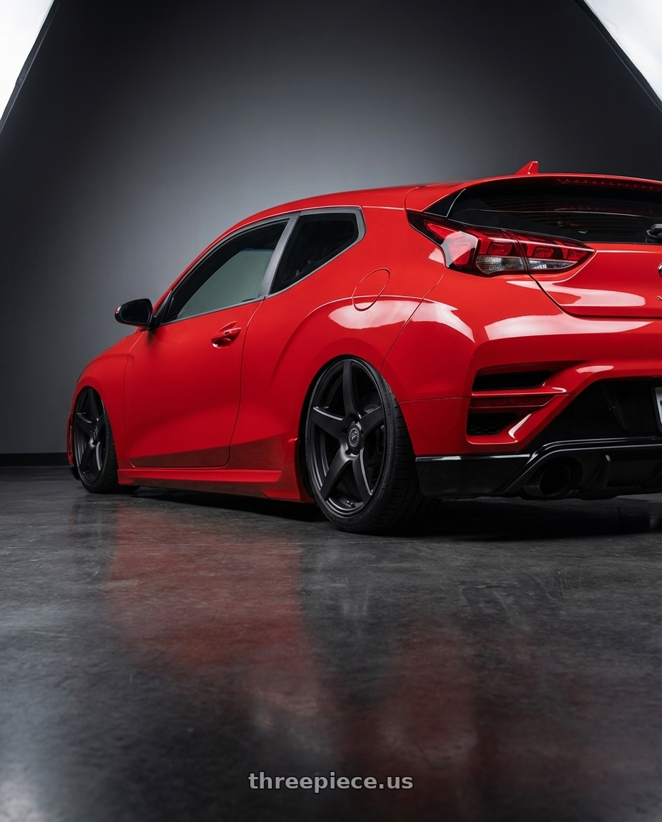 2022 Hyundai Veloster N with Forgestar CF5 5x114.3 19x9.5 +29 Satin Black wheels rear three quarter view slight stretch tires