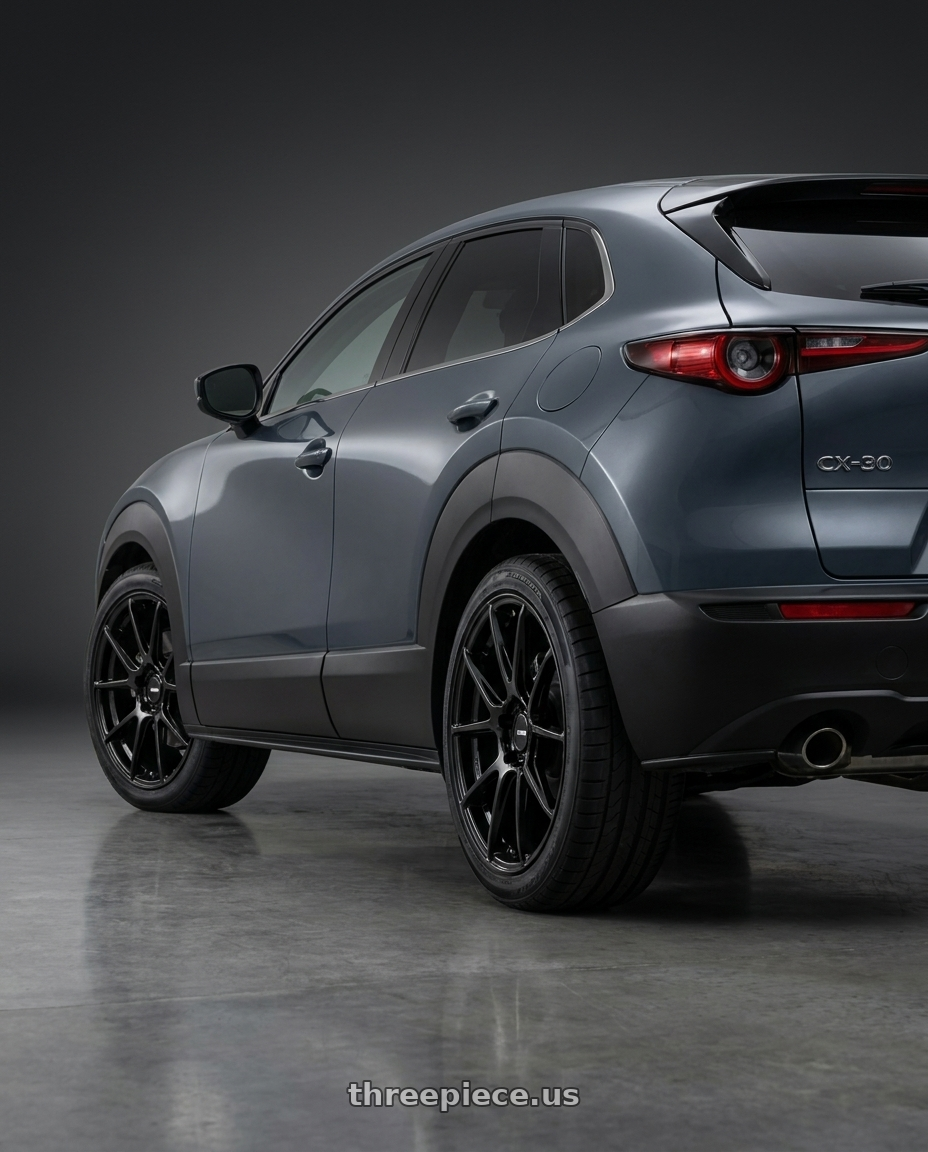 2026 mazda cx-30 with Enkei TS-V 5x114.3 18x8.5+25 Gloss Black wheels rear three quarter view square tires