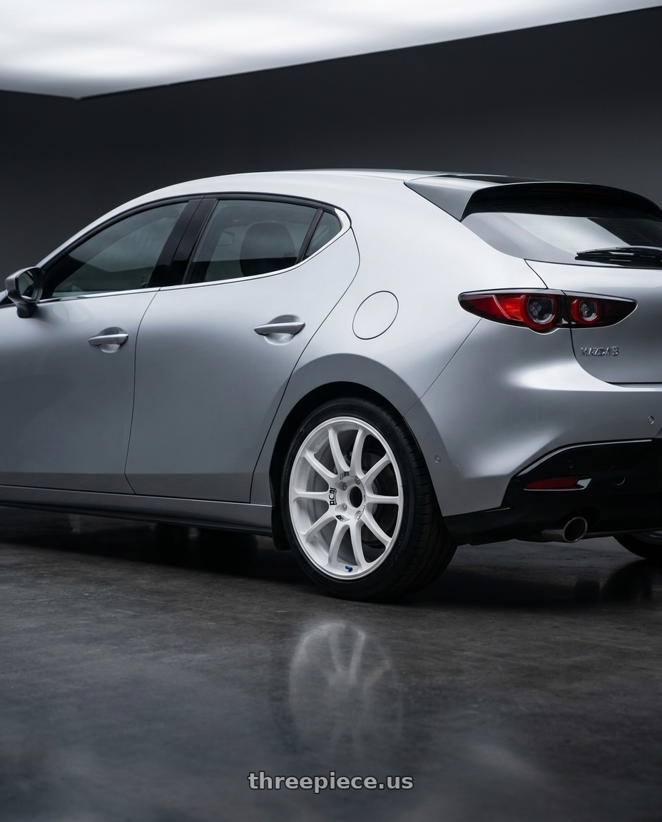 2022 mazda 3 with Advan RCIII 5x114.3 18x7.5+45 White wheels rear three quarter view slight stretch tires