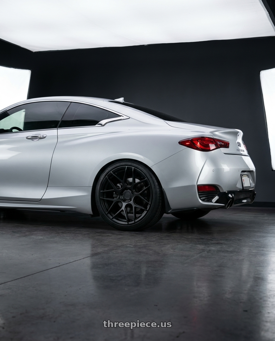 2020 Infiniti Q60 with Aodhan AFF2 5x114.3 19x9.5+35 Matte Black wheels rear three quarter view square tires