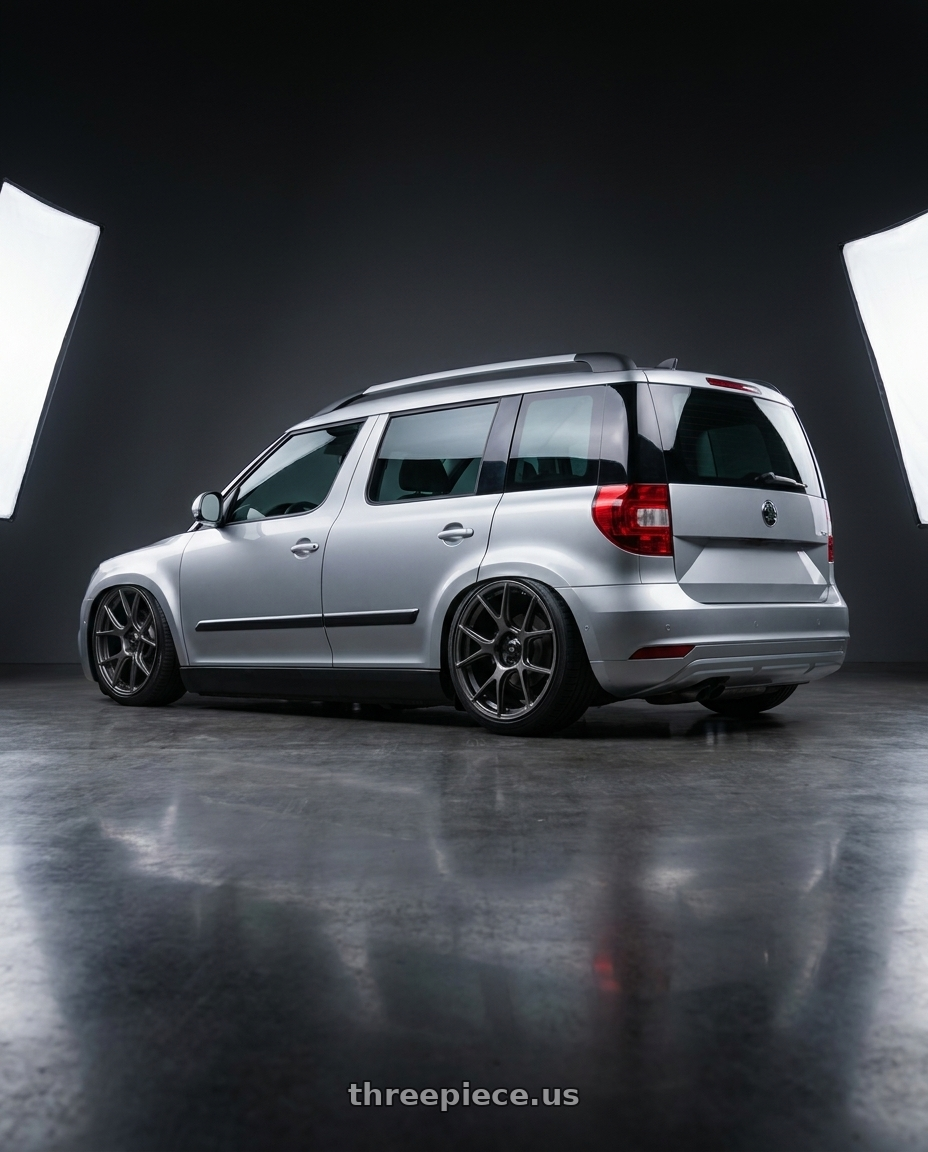 2015 Skoda Yeti with Konig Ampliform 5x112 19x8.5+32 Dark Metallic Graphite wheels rear three quarter view slight stretch tires