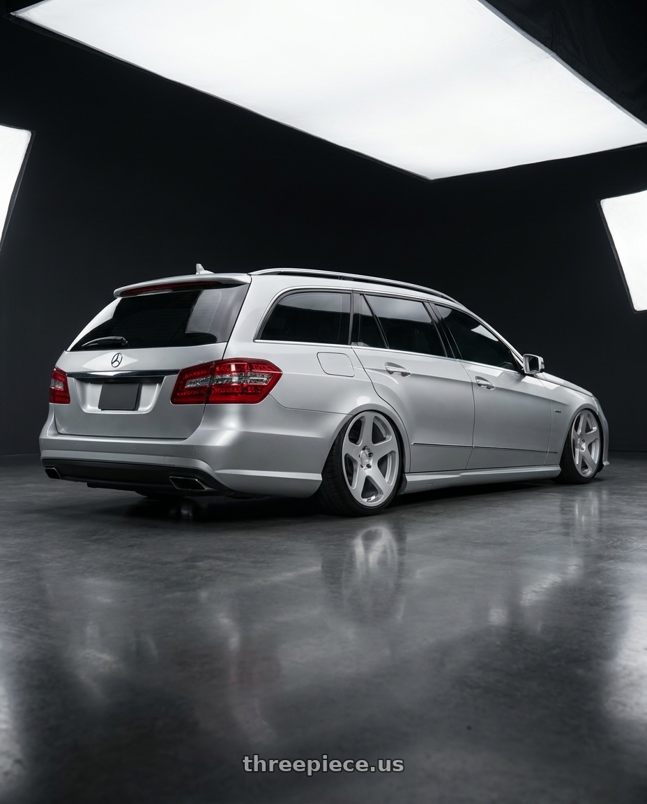 2010 Benz s212 with Rotiform RC200 NUE 5X120 20x8.5 +35 GLOSS SILVER wheels rear three quarter view square tires