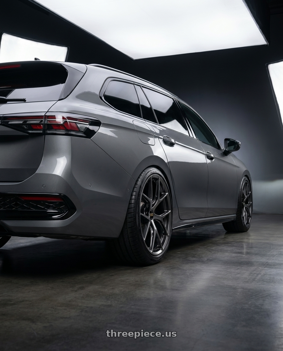 2025 Passat Variant with BBS FI-R 5x112 20x9.5 +25 Diamond Black wheels rear three quarter view extreme stretch tires