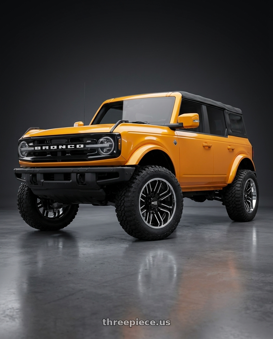 2024 Ford Bronco with Moto Metal MO202 6X139.7 20X10 -18 GLOSS BLACK MACHINED CENTER CHROME LIP wheels