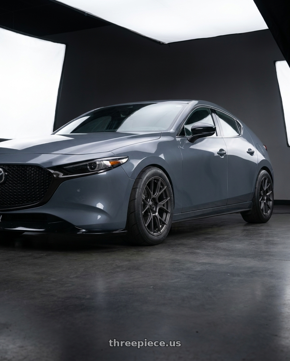 2023 mazda 3 hatchback carbon with Konig Ampliform 5x114.3 18x10+20 Dark Metallic Graphite wheels