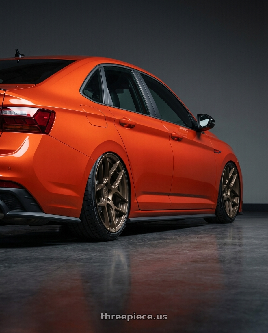 2023 Volkswagen Jetta GLI MK7 with Aodhan AFF2 5x112 19x9.5+35 Matte Bronze wheels rear three quarter view slight stretch tires