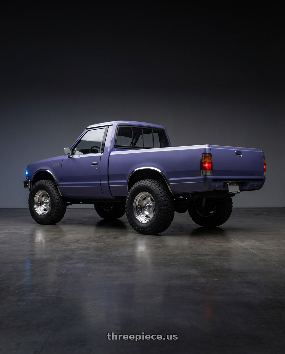 1985 nissan 720 with Center Line Convo Pro 2.0 5X114.3 15x10 -55 Polished wheels rear three quarter view meaty tires