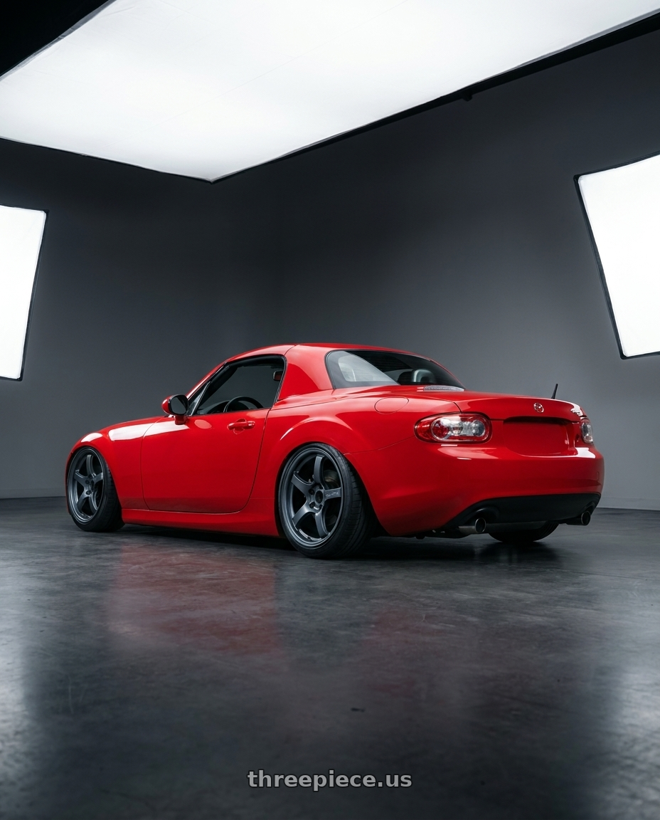 2012 Mazda MX-5 Miata NC with Gram Lights 57CR 5x114.3 17x9+22 Gunblue II wheels rear three quarter view slight stretch tires