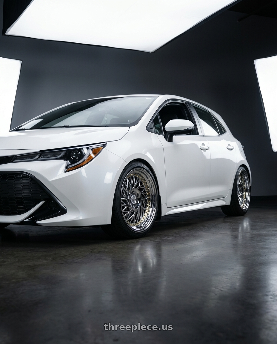2023 Toyota Corolla Hatchback with Aodhan DS03 5x114.3 18x9.5 +30 Vacuum Chrome w/Gold Rivets wheels
