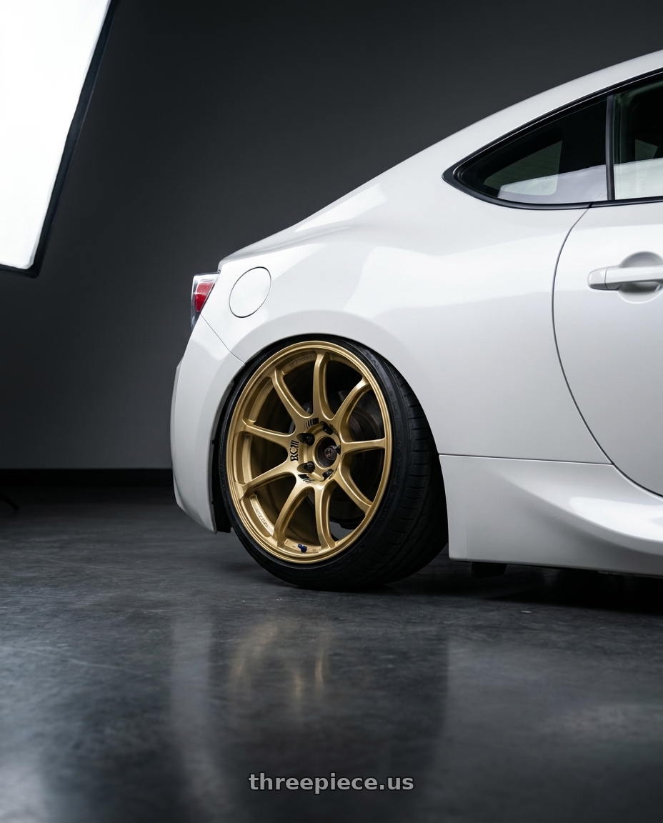 2016 Scion FR-S with Advan RCIII 5x100 17x7+43 Gold wheels rear three quarter view slight stretch tires