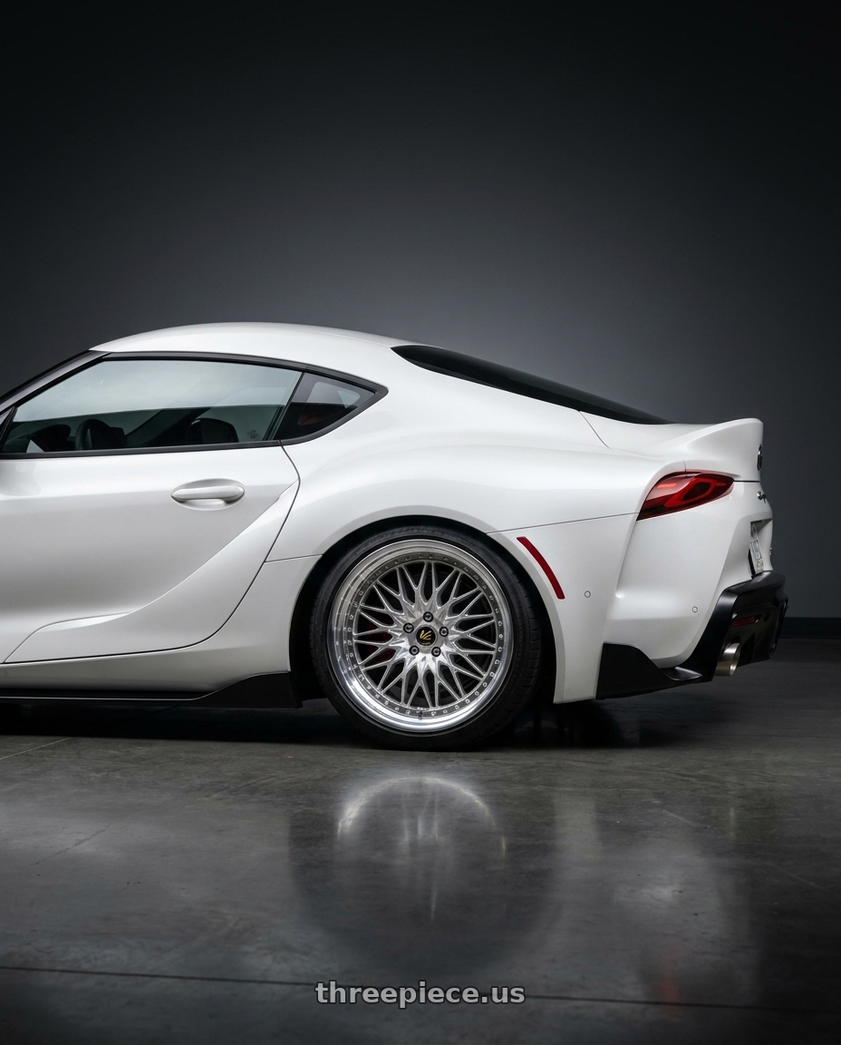 2023 Toyota GR Supra with Work Vs-Xv 5x112 19x9.5+22 L Disk Silky Rich Silver wheels rear three quarter view square tires