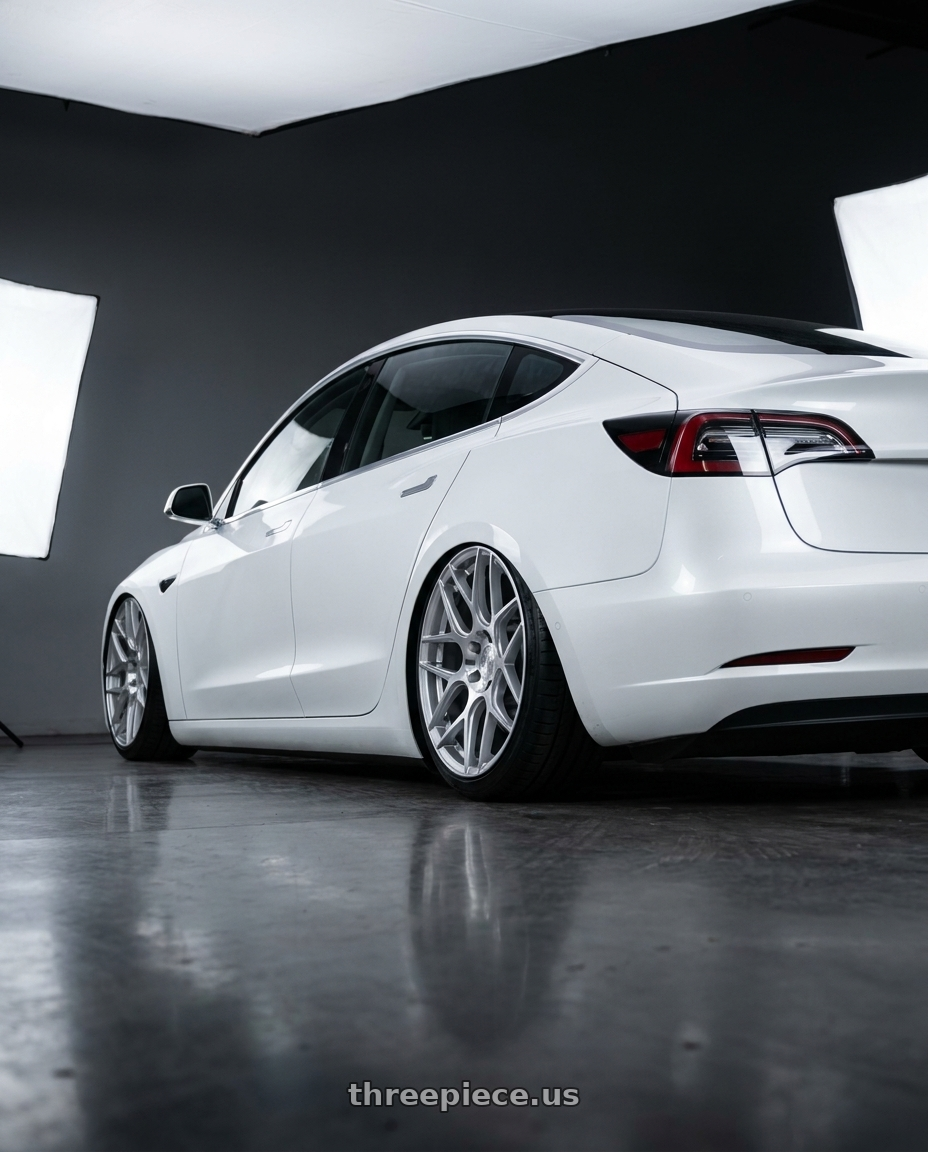 2023 Tesla Model 3 with Aodhan AFF2 5x114.3 19x8.5+35 Gloss Silver Machined Face wheels rear three quarter view slight stretch tires