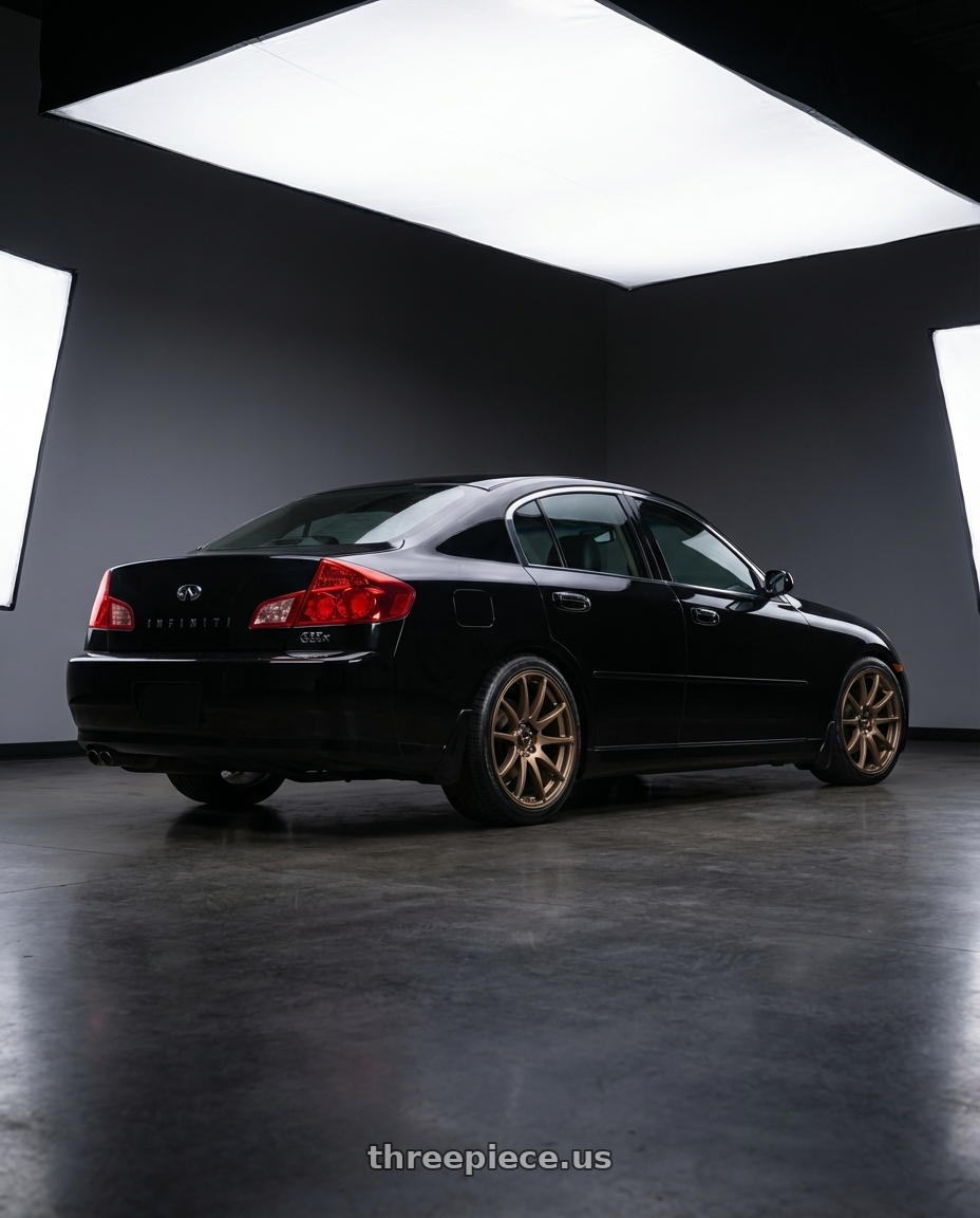 2005 Infiniti G35x with Vors TR4 5x114.3 17x9 +30 Bronze wheels rear three quarter view square tires