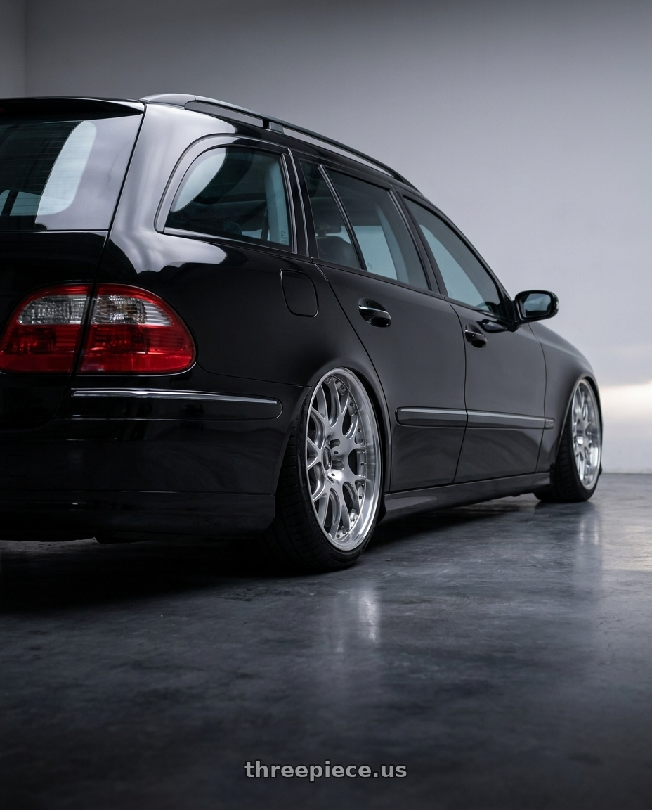 2004 s211 e320 with Advan Racing ONI2 PROGRESSIVE 5x112 20x9.5 +25 MACHINING & DIAMOND CUT wheels rear three quarter view slight stretch tires