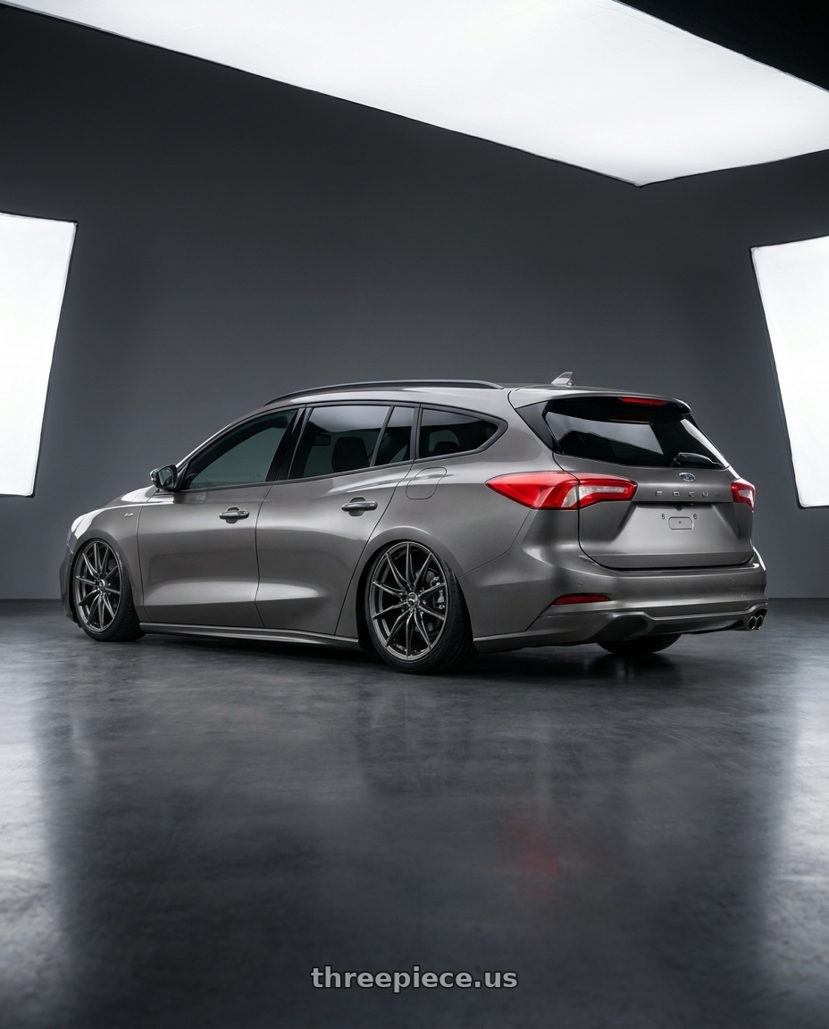 2024 Focus st line wagon with Enkei DRACO 5x114.3 18x8.0+35 Anthracite wheels rear three quarter view slight stretch tires