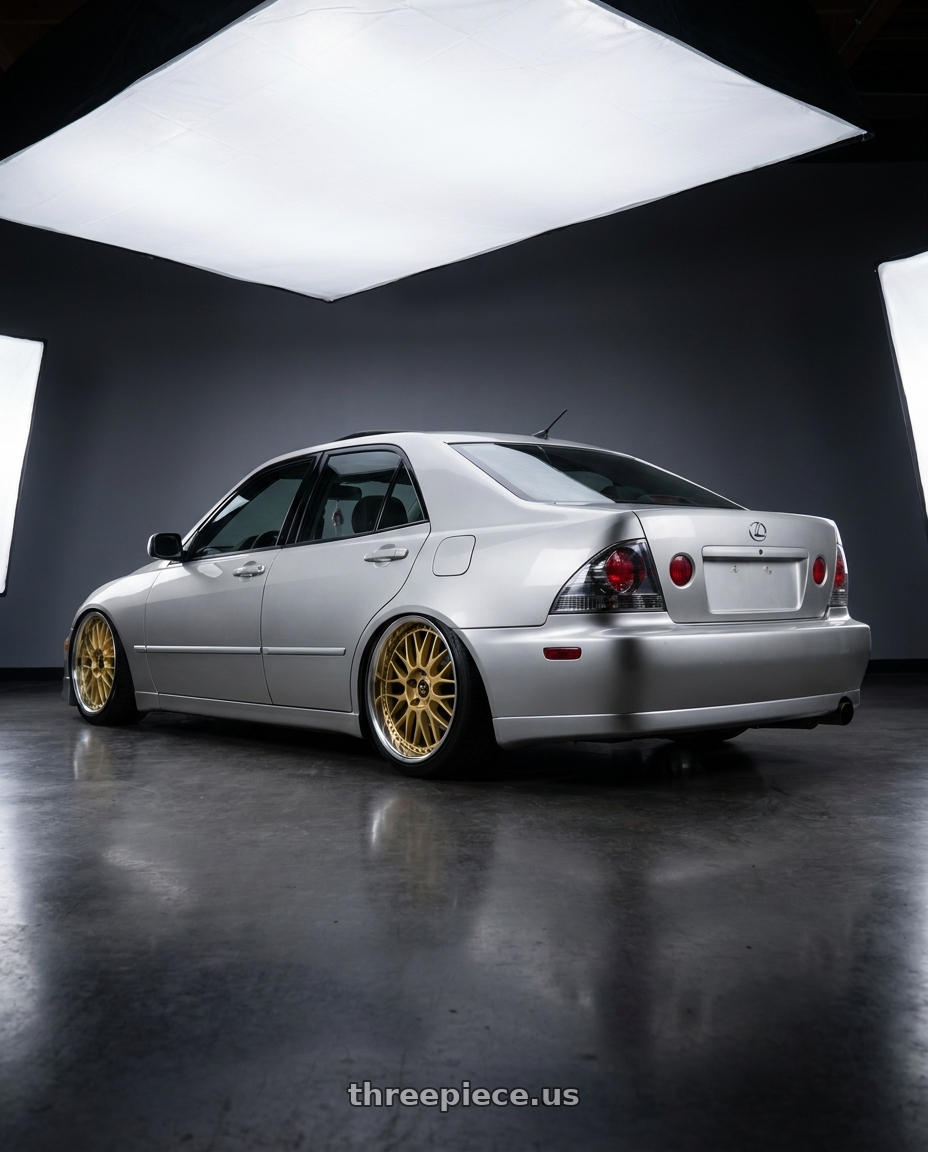 2004 lexus is300 with Work Vs-Xx 5x114.3 18x8+38 A Disk Gold wheels rear three quarter view square tires