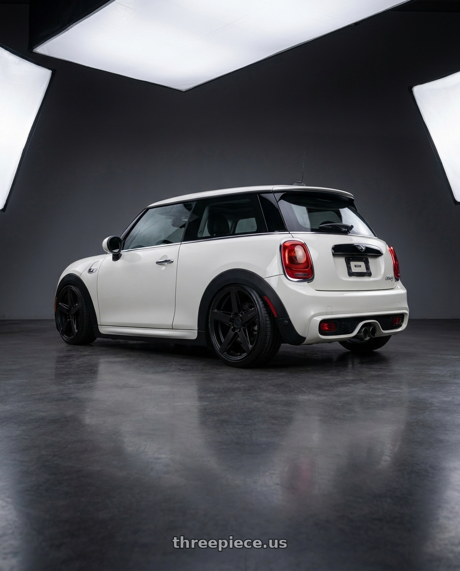 2017 mini cooper with Niche 1PC M269 TERAMO 5X112 18X8 +42 MATTE BLACK wheels rear three quarter view square tires
