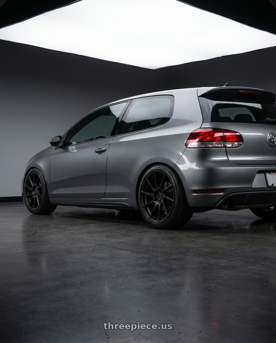 2013 Volkswagen GTI MK6 with Aodhan AH09 5x112 18x8.5 +35 Matte Black wheels rear three quarter view square tires