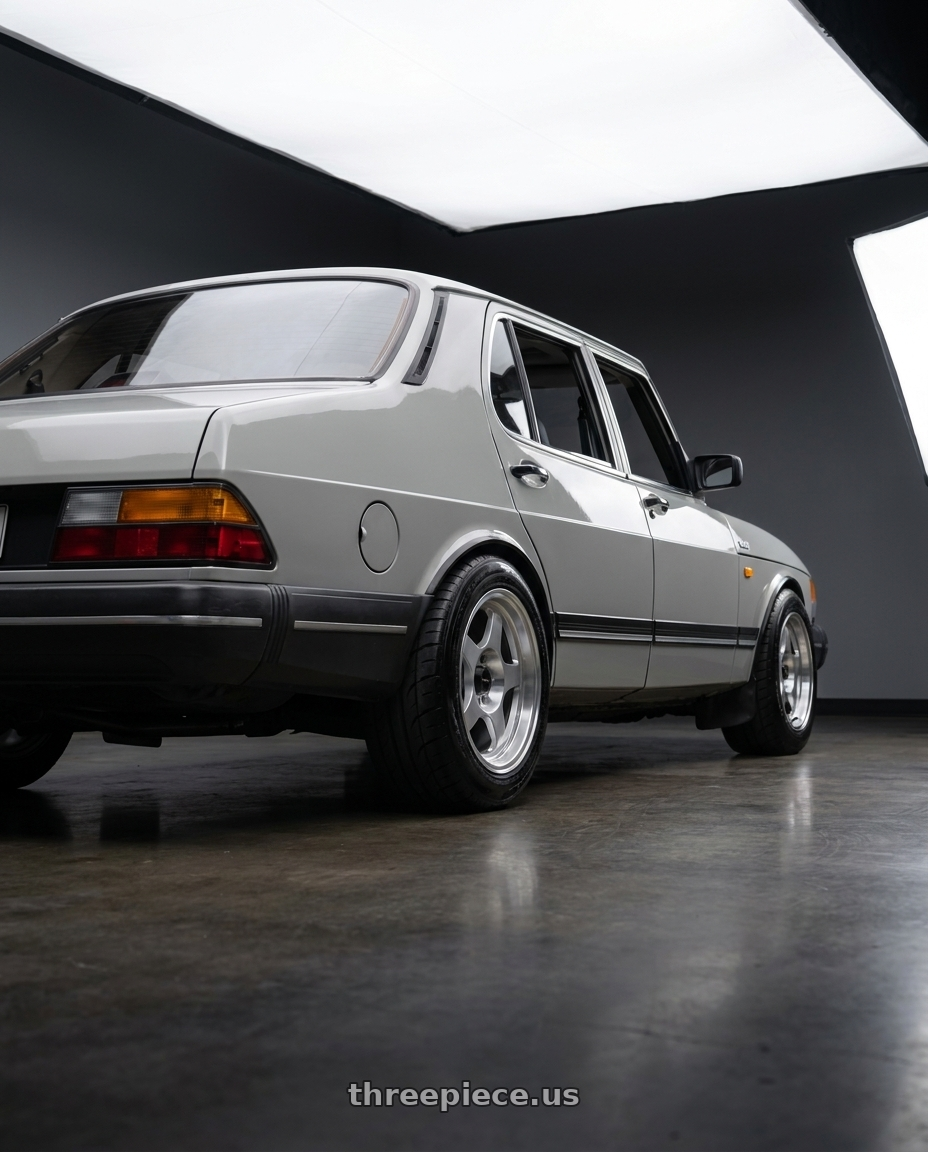 1989 Saab 900 with Vors SP1 4x108 15x7  +35 Silver Machine Face Lip wheels rear three quarter view meaty tires