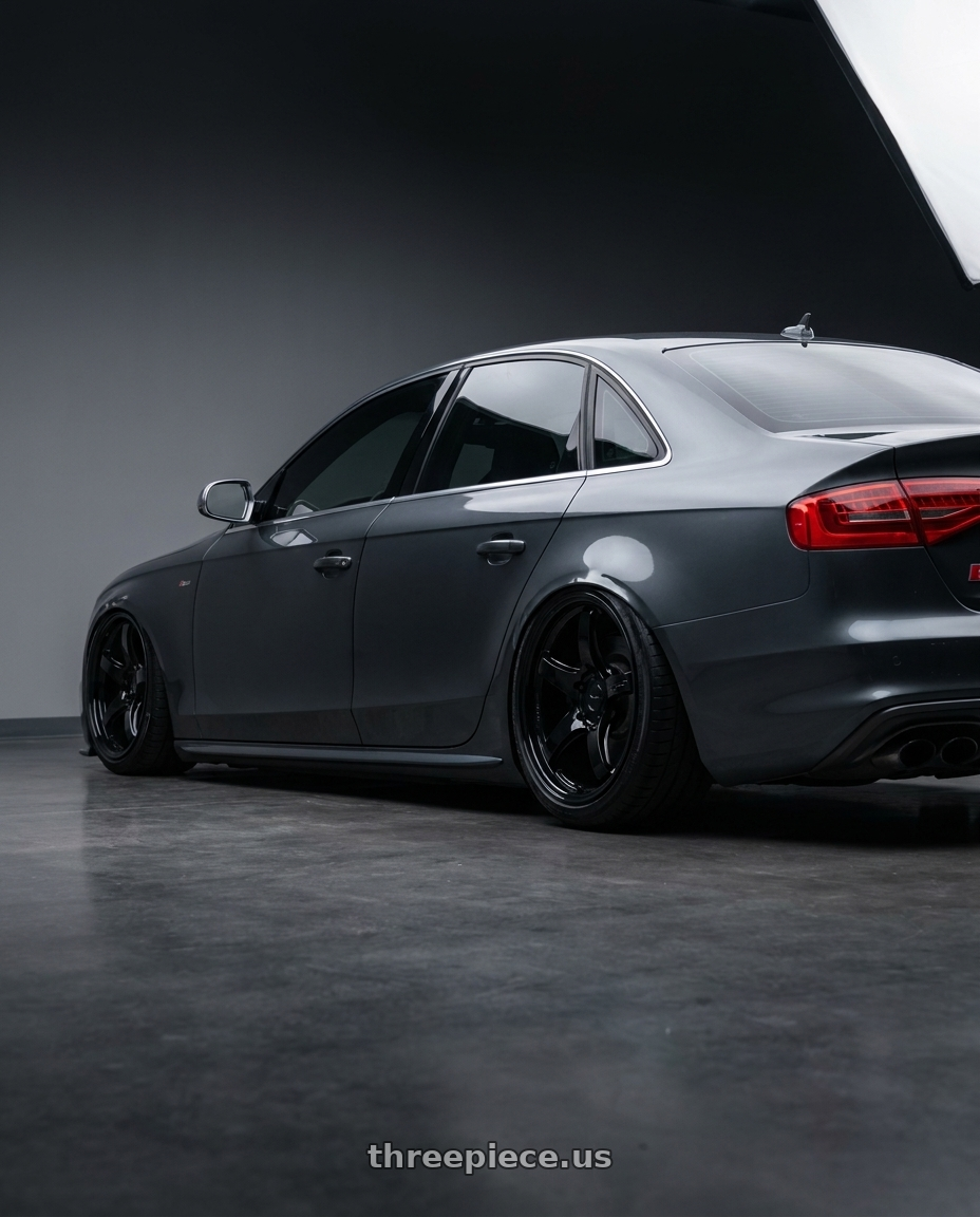 2015 Audi S4 B8.5 with Gram Lights 57CR 5x112 19x10.5+35 Glossy Black wheels rear three quarter view slight stretch tires