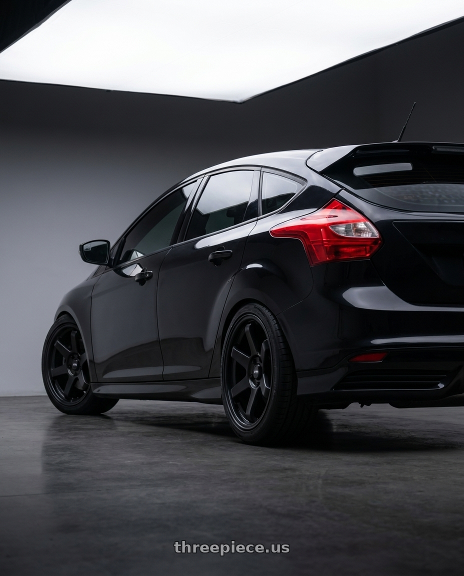 2013 focus st black with F1R F106 5x114.3 17x8 +35 Satin Black wheels rear three quarter view square tires