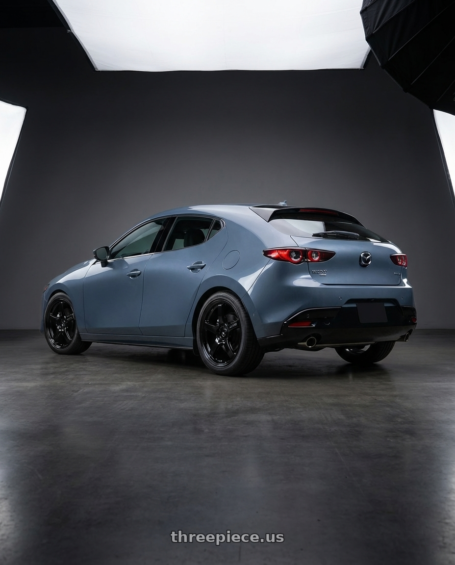 2023 Mazda Mazda3 Turbo with Gram Lights 57CR 5x114.3 18x9.5+12 Glossy Black wheels rear three quarter view square tires