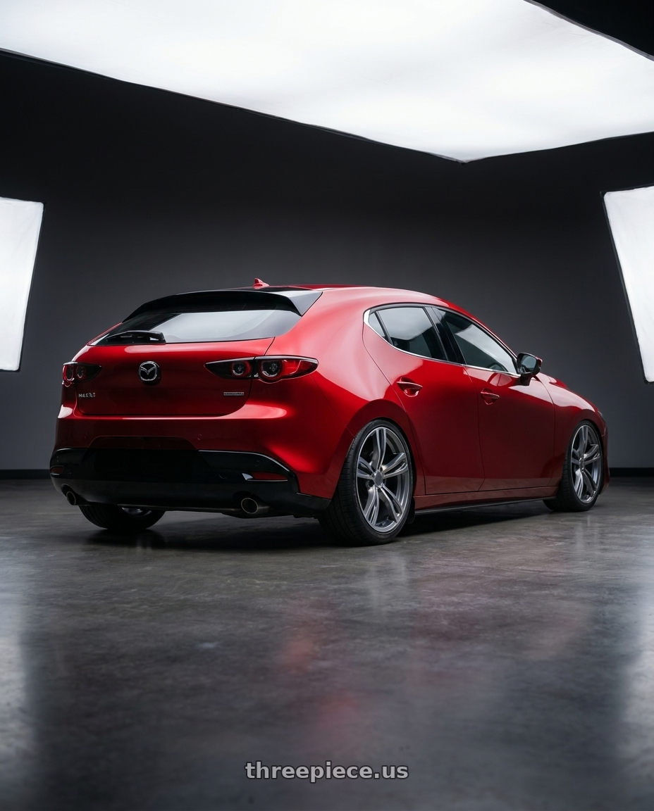 2024 Mazda 3 with REPLICA WHEELS R5056 5x120 19x8.5+35 GREY  / MACHINE wheels rear three quarter view slight stretch tires