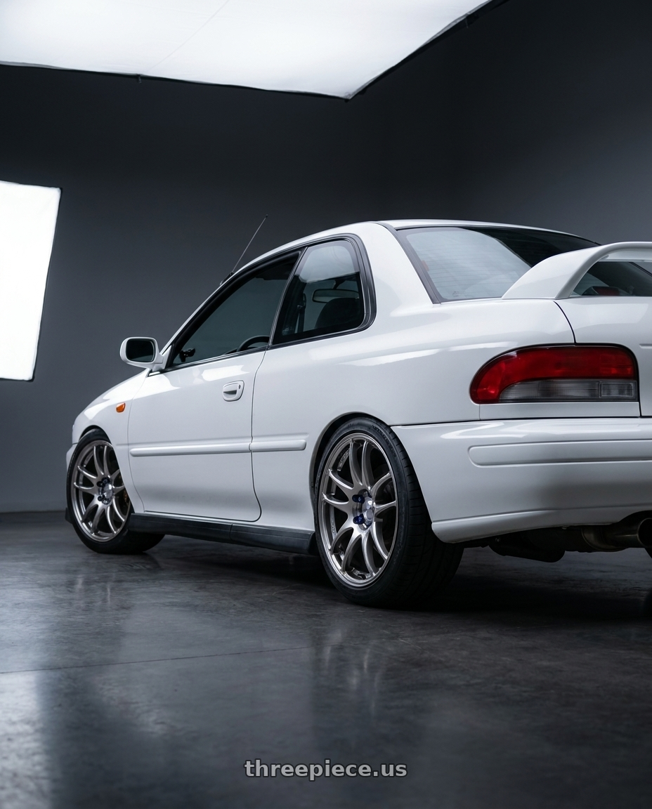 Aspen White 2001 Subaru Impreza RS with Work Emotion Cr Kiwami 5x100 17x7 +47 Gt Silver wheels rear three quarter view square tires