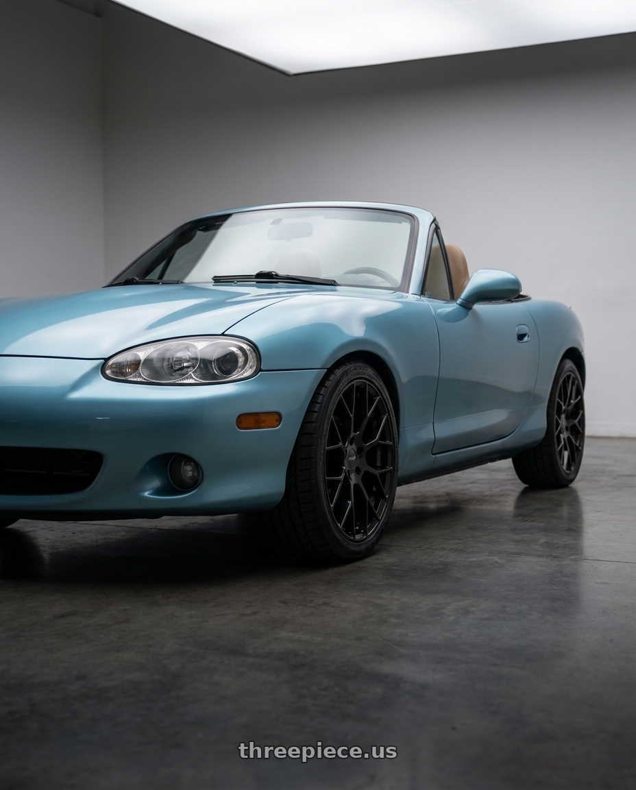 2002 Mazda Miata with Petrol P2B 4X100 15X7 +40 GLOSS BLACK wheels
