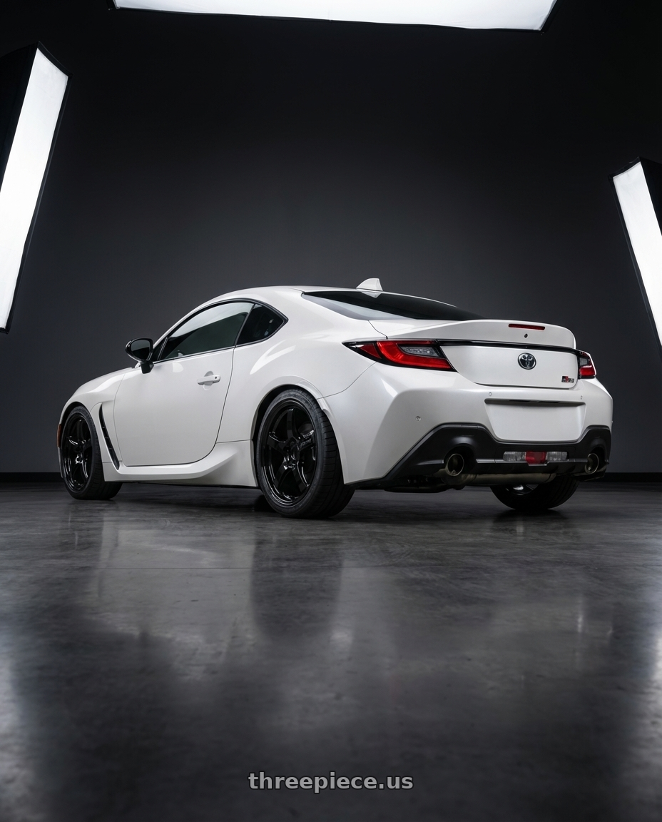2016 Scion FR-S with Gram Lights 57CR 5x100 17x9+38 Glossy Black wheels rear three quarter view square tires