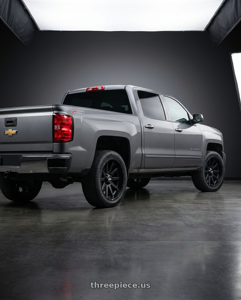 2018 Chevrolet Silverado 1500 SSV with Ion Type 143 6x139.7 20x10-19 Matte Black wheels rear three quarter view square tires
