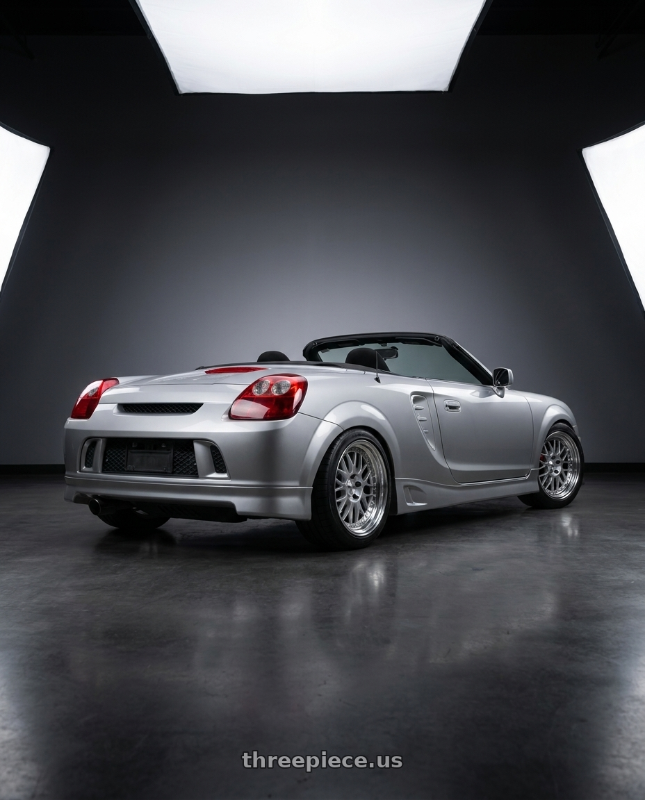 2001 Toyota Mr2 Spyder with Work Meister M1 3p 4x100 16x8+33 A Disk Silver wheels rear three quarter view square tires